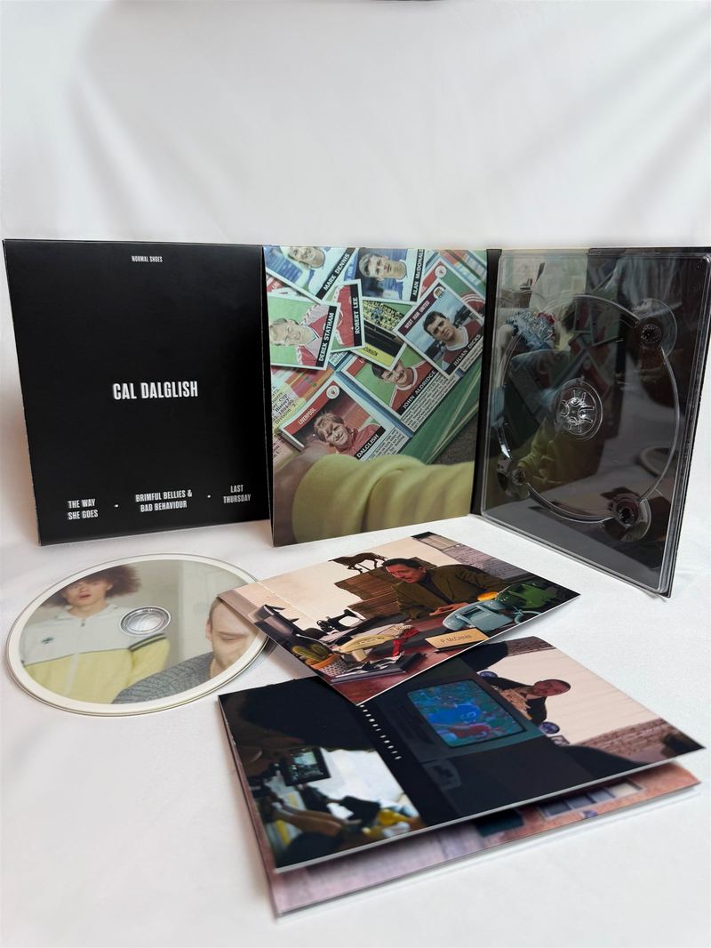 A finished Normal Shoes collection — case, digipak, disc and printed inserts